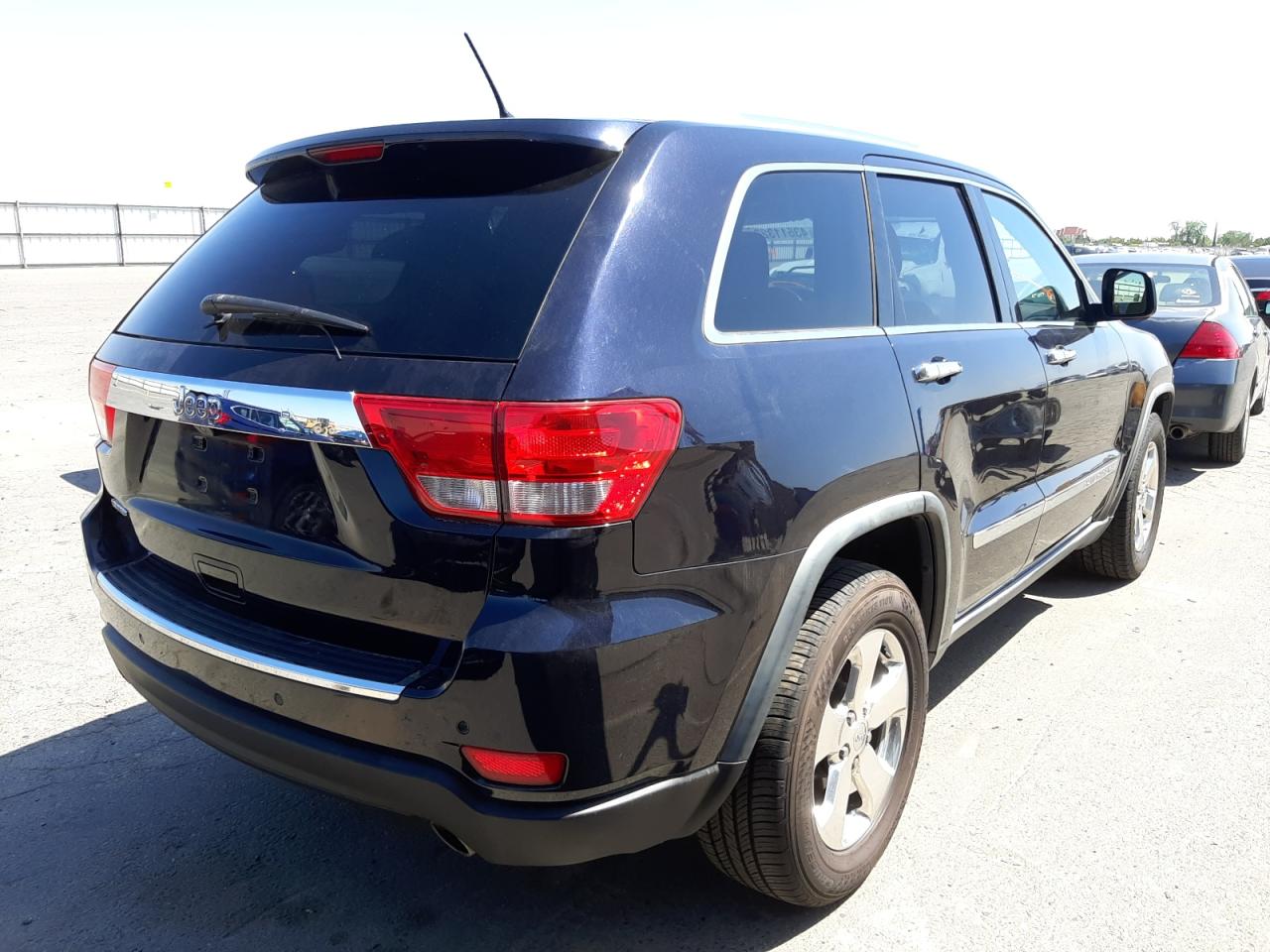 Photo 4 from auction – 2011 JEEP GRAND CHER with VIN 1J4RS5GG9BC650961