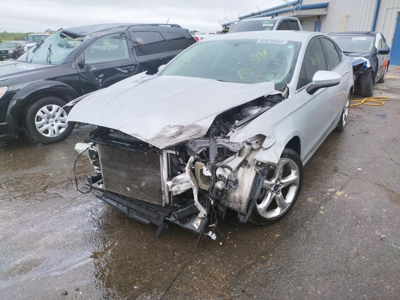 Photo 9 from auction – 2016 FORD FUSION S with VIN 3FA6P0G76GR323039