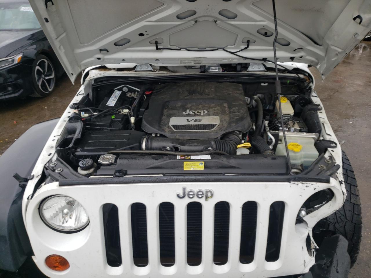 Photo 7 from auction – 2013 JEEP WRANGLER U with VIN 1C4BJWDG1DL599348