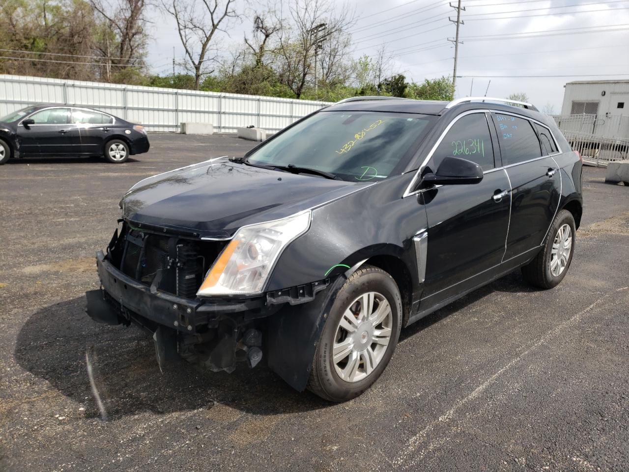 Photo 2 from auction – 2014 CADILLAC SRX LUXURY with VIN 3GYFNEE35ES601457