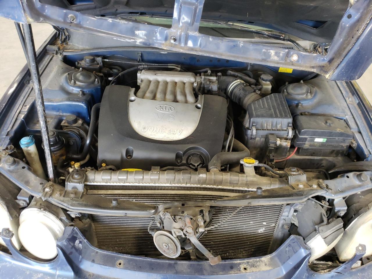 Photo 7 from auction – 2003 KIA OPTIMA LX with VIN KNAGD128935204571