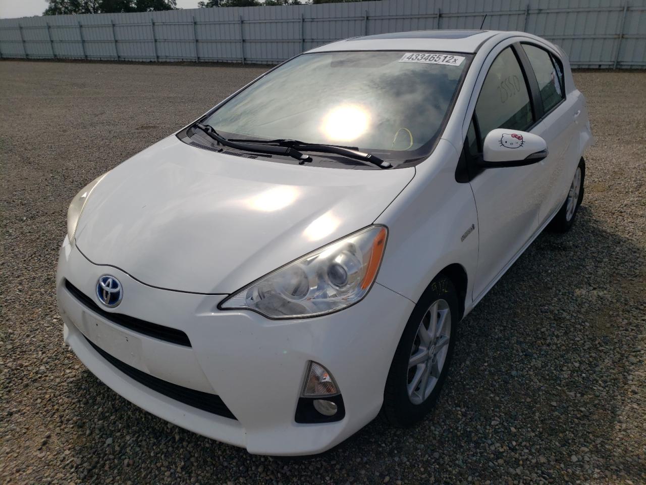 Photo 2 from auction – 2012 TOYOTA PRIUS C with VIN JTDKDTB3XC1017456