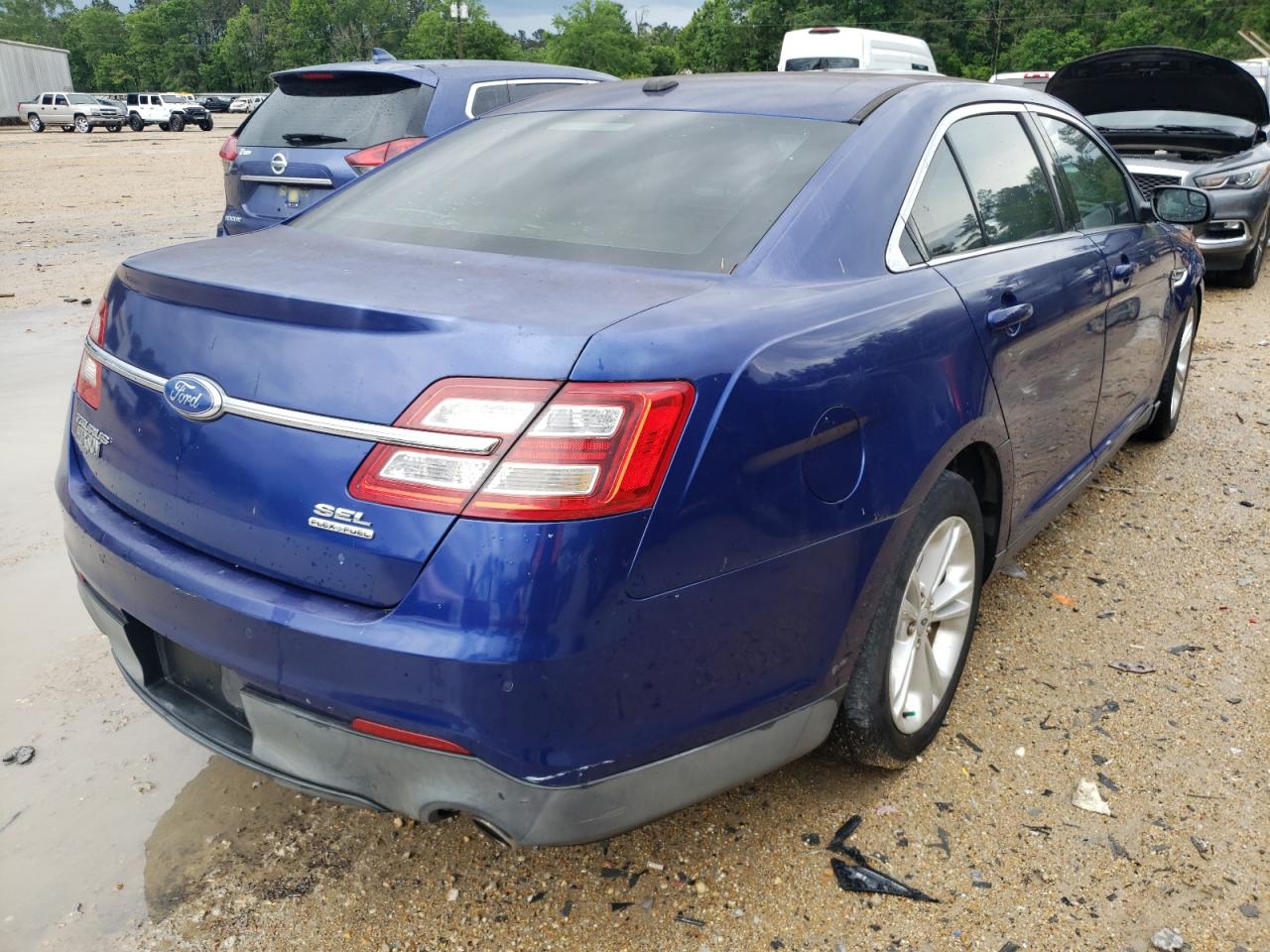 Photo 4 from auction – 2013 FORD TAURUS SEL with VIN 1FAHP2E87DG114380