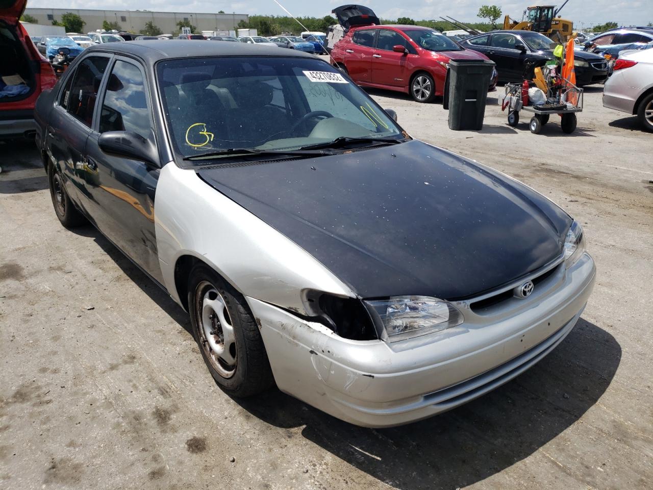 TOYOTA COROLLA VE 2000 with VIN 1NXBR12E8YZ326643 - Photo from auction