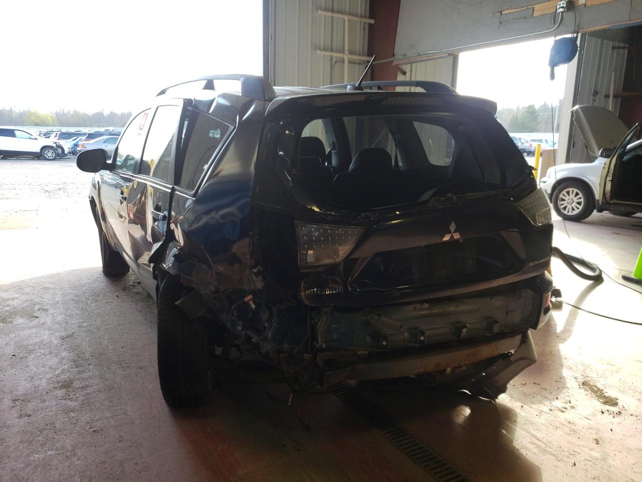 Photo 9 from auction – 2010 MITSUBISHI OUTLANDER with VIN JA4JT3AW4AZ008884
