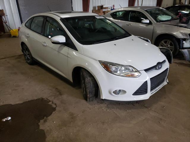 FORD FOCUS SE 2014 with VIN 1FADP3F28EL129249 - Photo from auction
