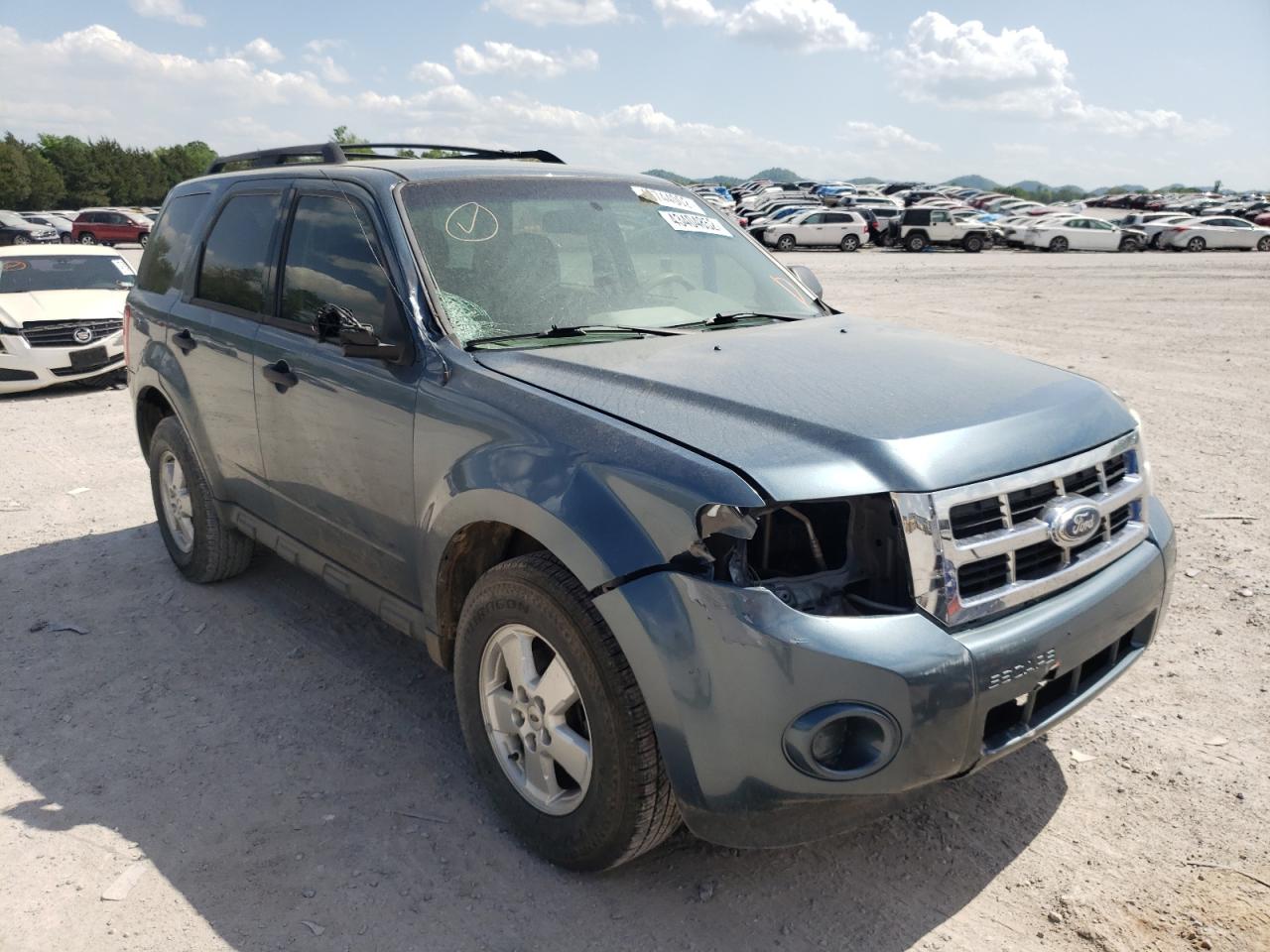 FORD ESCAPE XLS 2011 with VIN 1FMCU0C72BKB27667 - Photo from auction