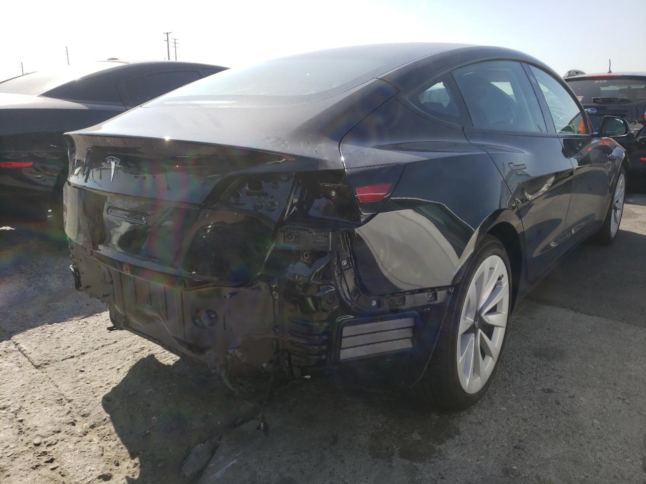 Photo 4 from auction – 2021 TESLA MODEL 3 with VIN 5YJ3E1EA8MF085957