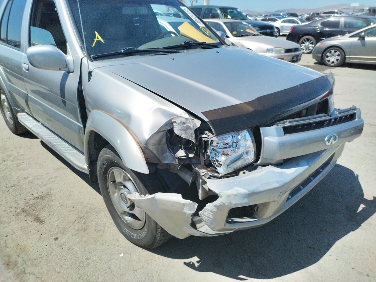 Photo 9 from auction – 2001 INFINITI QX4 with VIN JNRDR09Y71W218077