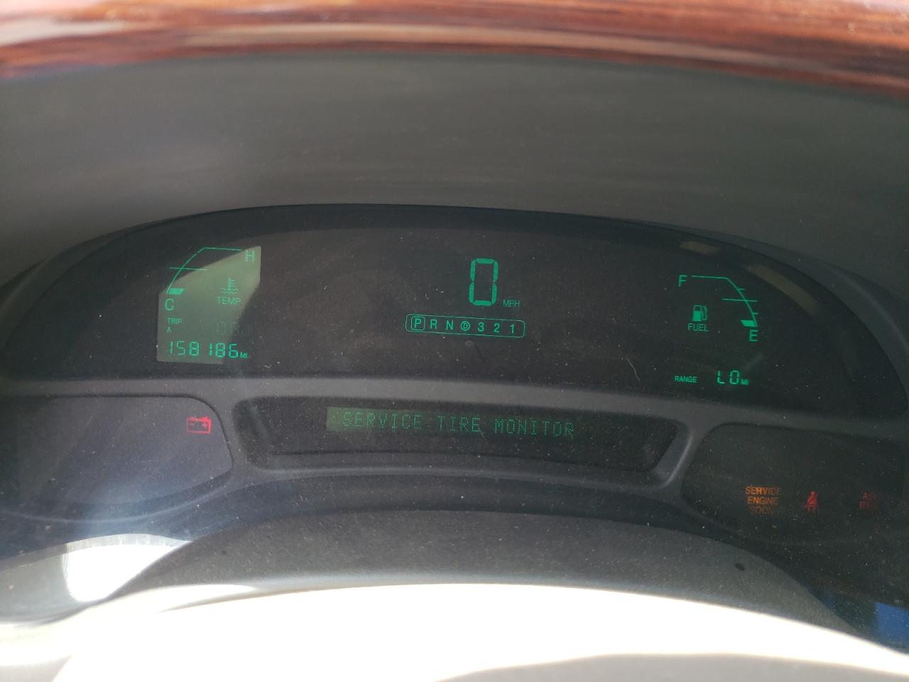 Photo 8 from auction – 2005 CADILLAC DEVILLE with VIN 1G6KD57Y95U131856