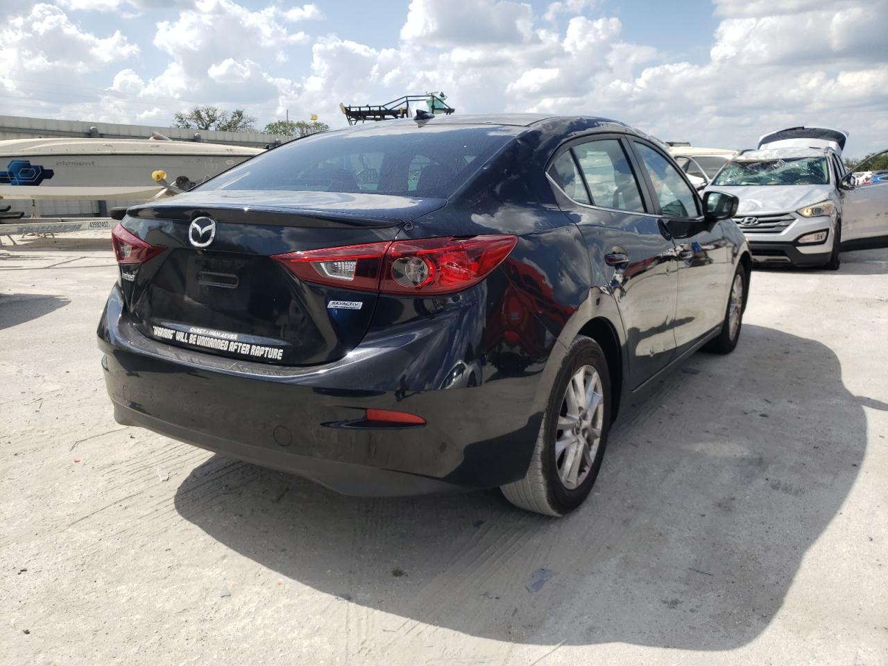Photo 4 from auction – 2016 MAZDA 3 TOURING with VIN JM1BM1W71G1309360