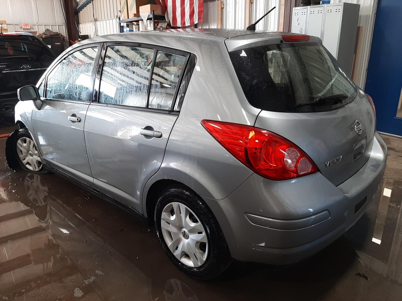 Photo 3 from auction – 2012 NISSAN VERSA S with VIN 3N1BC1CP4CL371932
