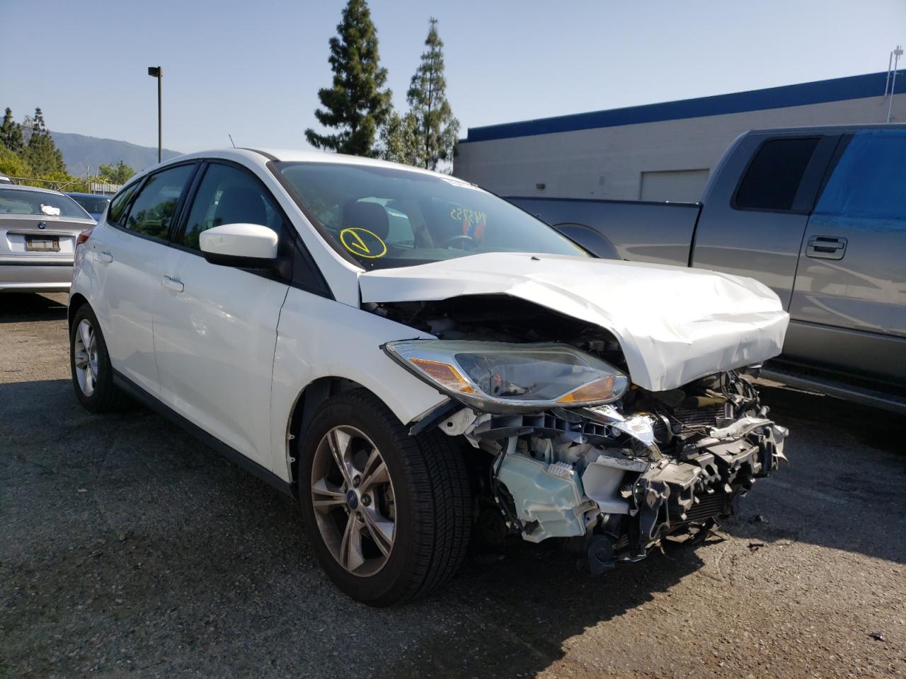 FORD FOCUS SE 2012 with VIN 1FAHP3K25CL400594 - Photo from auction