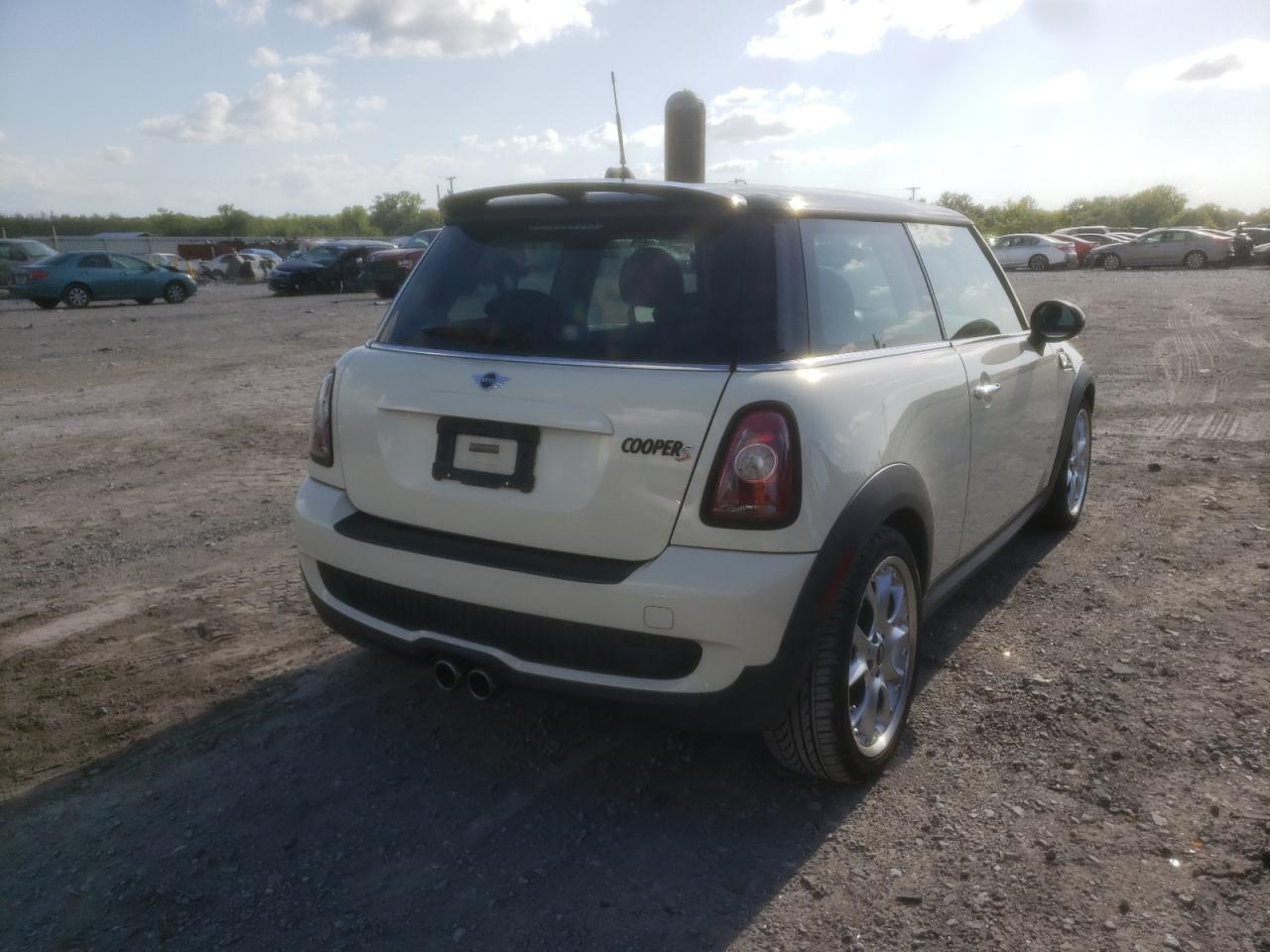 Photo 4 from auction – 2010 MINI COOPER S with VIN WMWMF7C58ATX43986