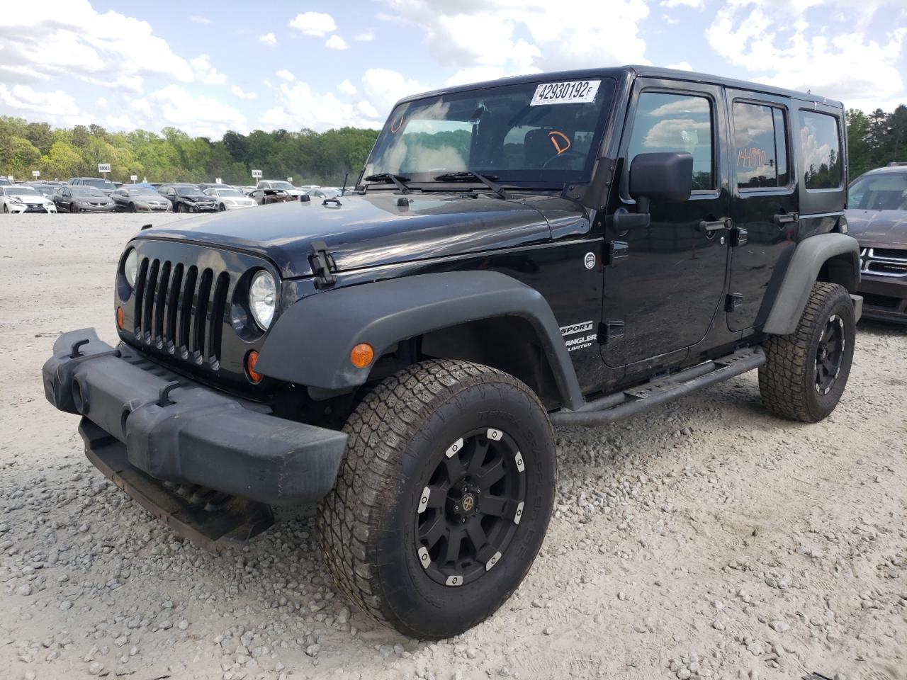 Photo 2 from auction – 2011 JEEP WRANGLER U with VIN 1J4BA3H18BL597088