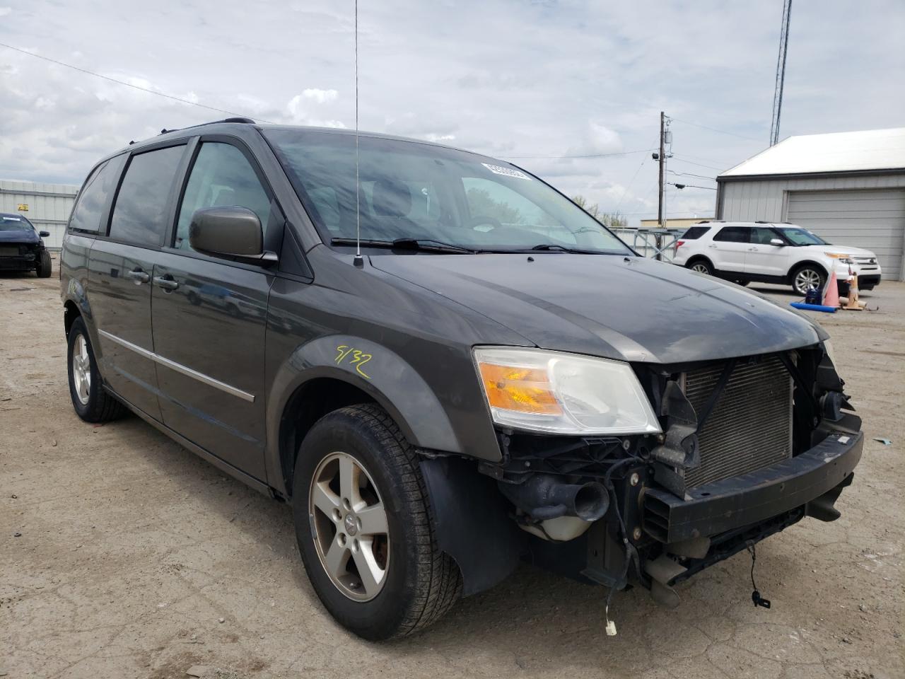 DODGE GRAND CARA 2010 with VIN 2D4RN5D11AR317238 - Photo from auction