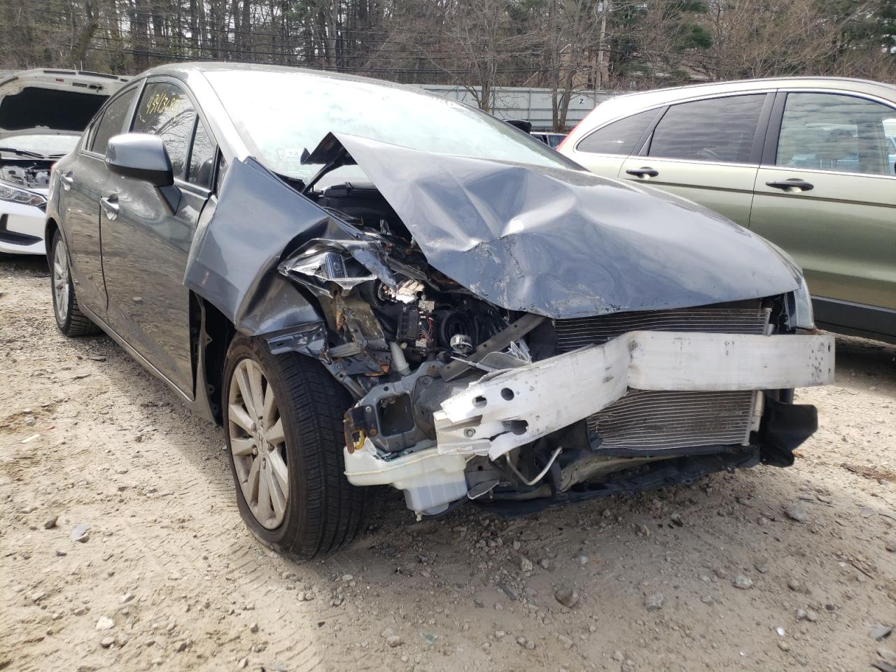 HONDA CIVIC LX 2012 with VIN 2HGFB2F57CH560781 - Photo from auction