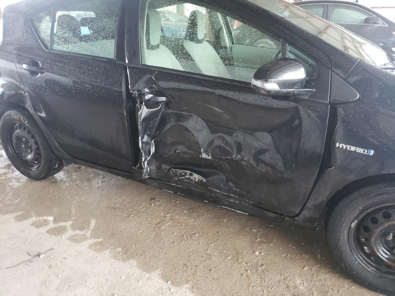 Photo 9 from auction – 2012 TOYOTA PRIUS C with VIN JTDKDTB38C1506437