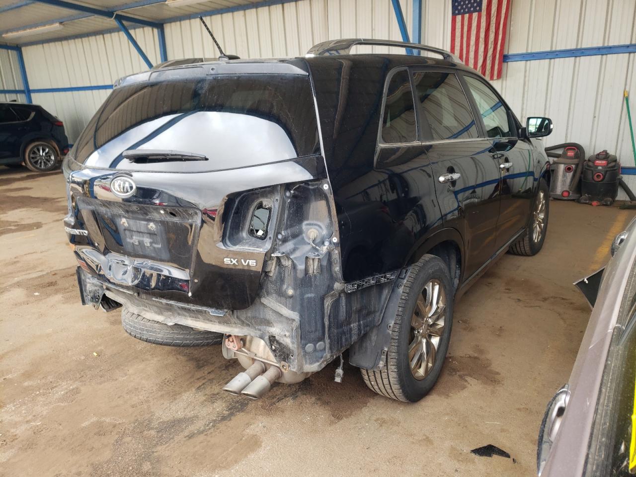Photo 4 from auction – 2011 KIA SORENTO SX with VIN 5XYKW4A26BG096146