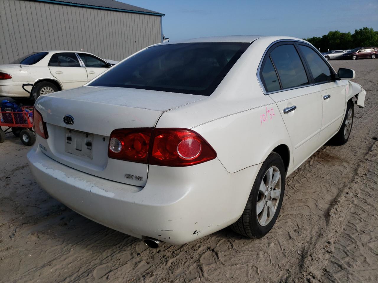 Photo 4 from auction – 2006 KIA OPTIMA LX with VIN KNAGE124065059368