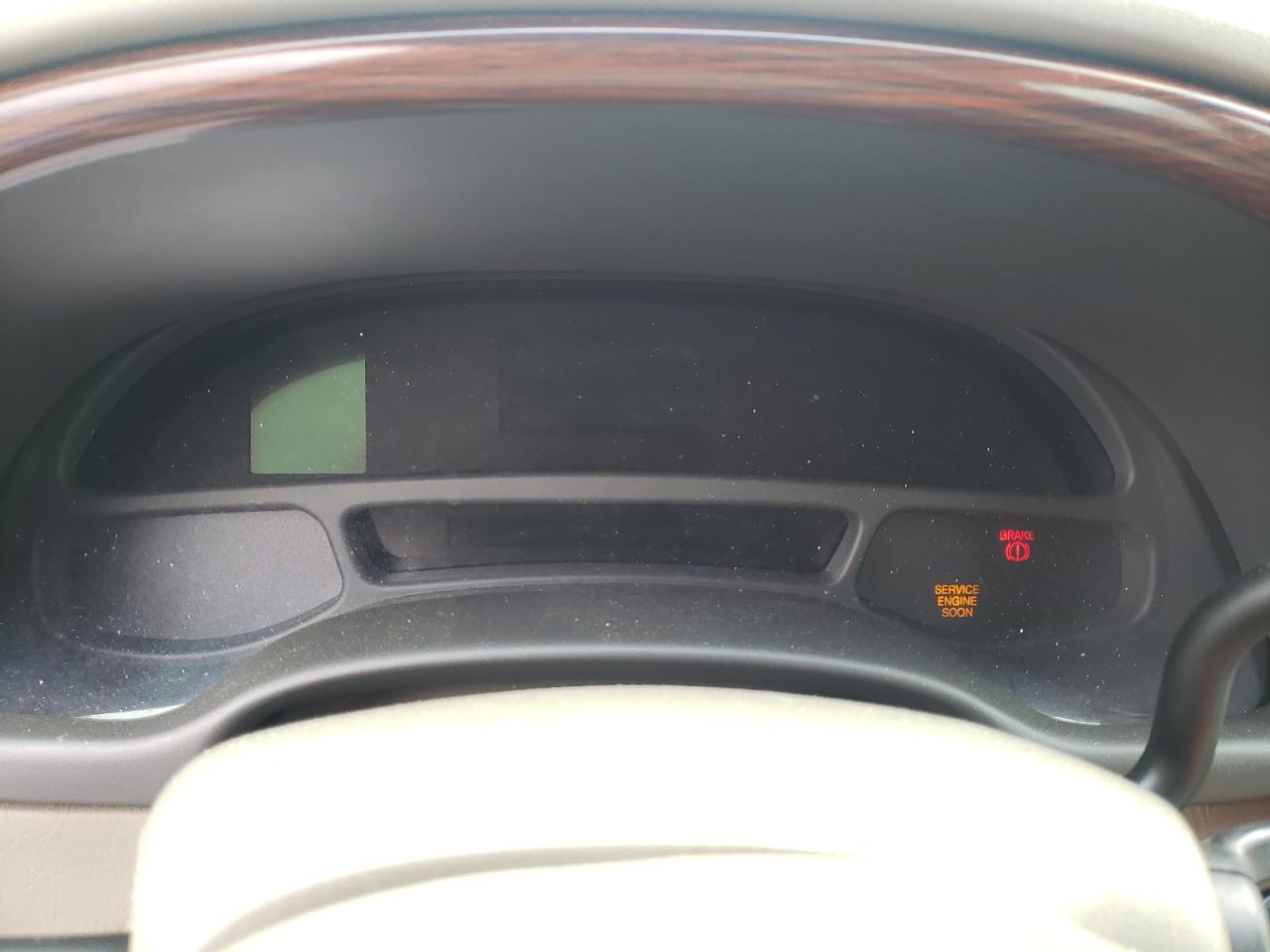 Photo 8 from auction – 2003 CADILLAC DEVILLE with VIN 1G6KD54Y23U277209