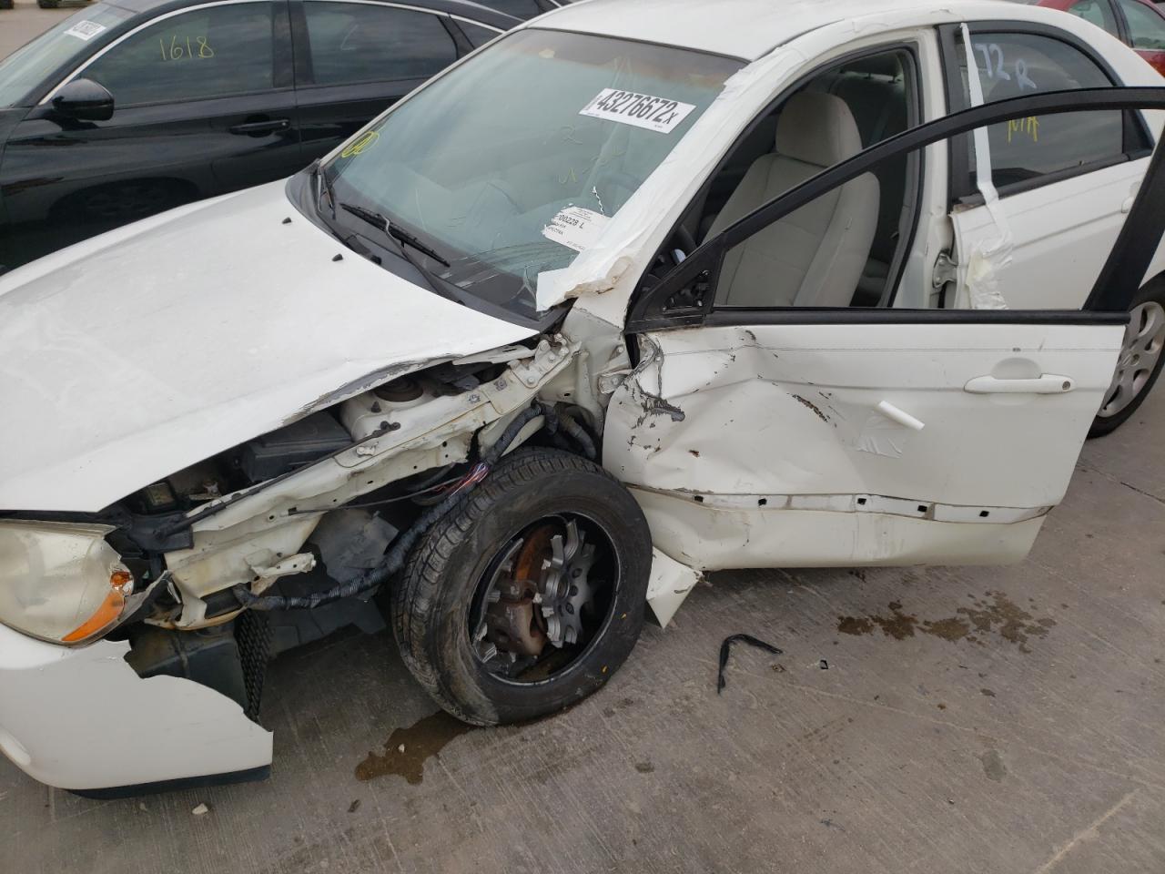 Photo 9 from auction – 2006 KIA SPECTRA LX with VIN KNAFE121165367263