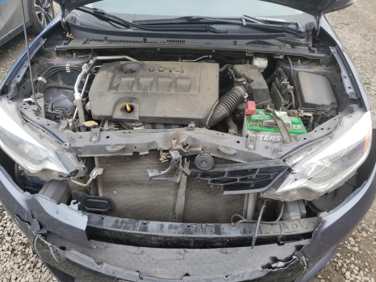 Photo 7 from auction – 2014 TOYOTA COROLLA L with VIN 5YFBURHE5EP106703