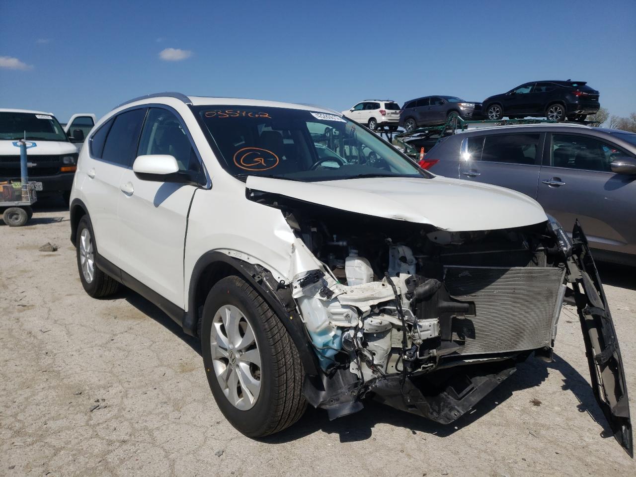 HONDA CR-V 2014 with VIN 5J6RM4H77EL035462 - Photo from auction