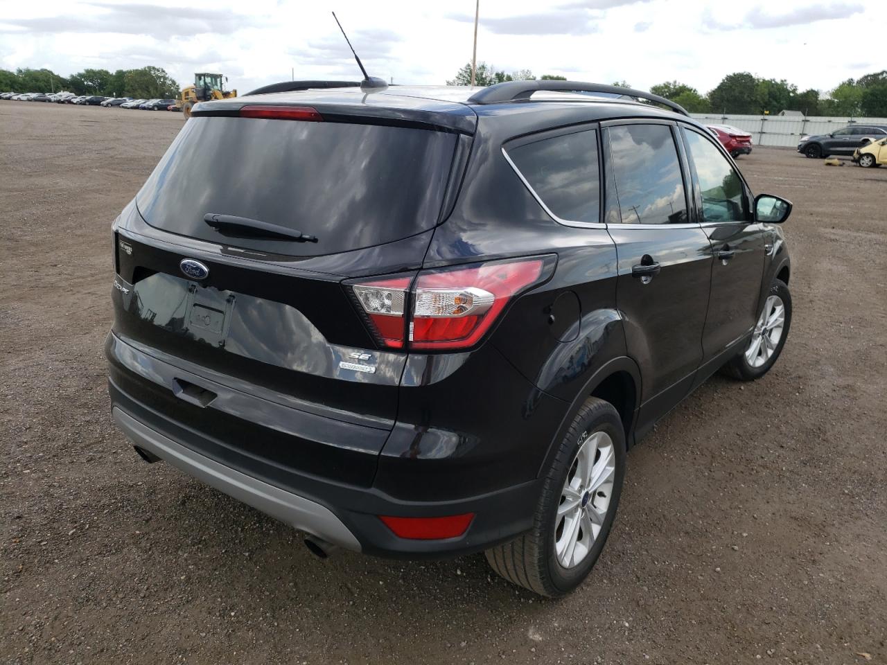 Photo 4 from auction – 2018 FORD ESCAPE SE with VIN 1FMCU0GD3JUB03350