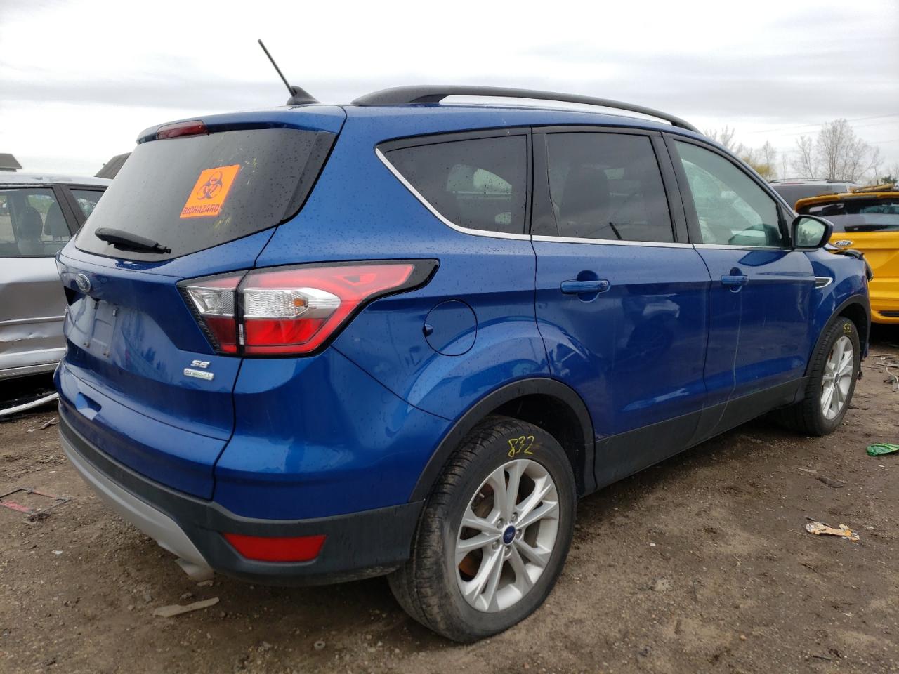 Photo 4 from auction – 2018 FORD ESCAPE SE with VIN 1FMCU0GD0JUA74468