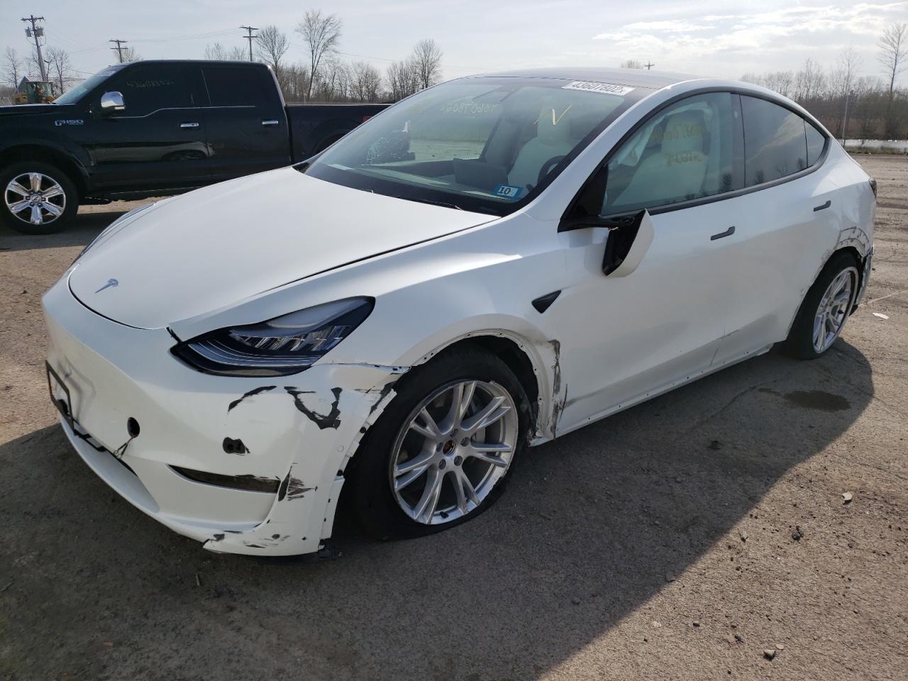 Photo 2 from auction – 2021 TESLA MODEL Y with VIN 5YJYGDEEXMF064483