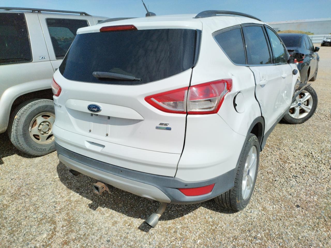 Photo 4 from auction – 2016 FORD ESCAPE SE with VIN 1FMCU9G95GUA68531