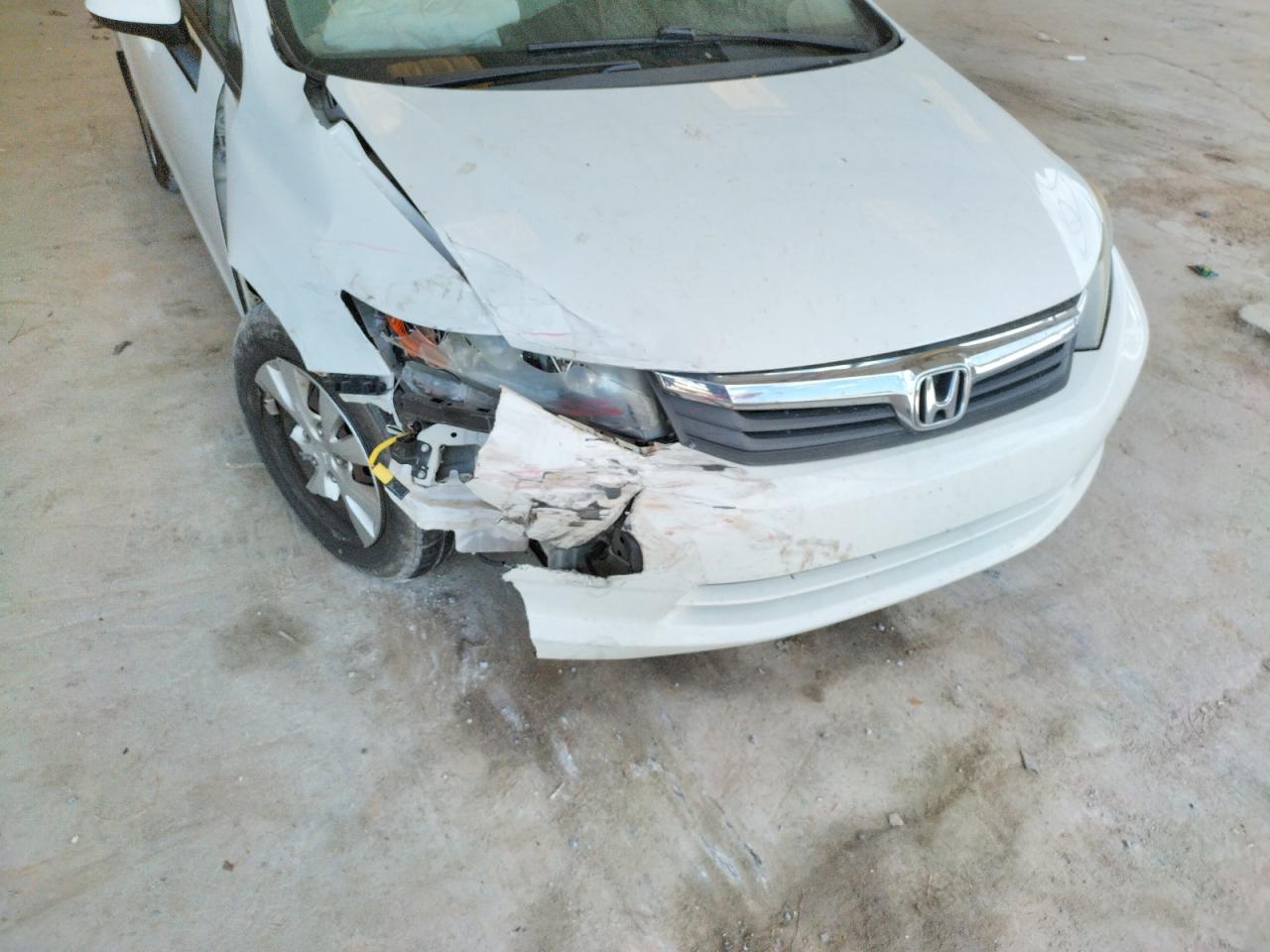 Photo 9 from auction – 2012 HONDA CIVIC LX with VIN 19XFB2F53CE007930