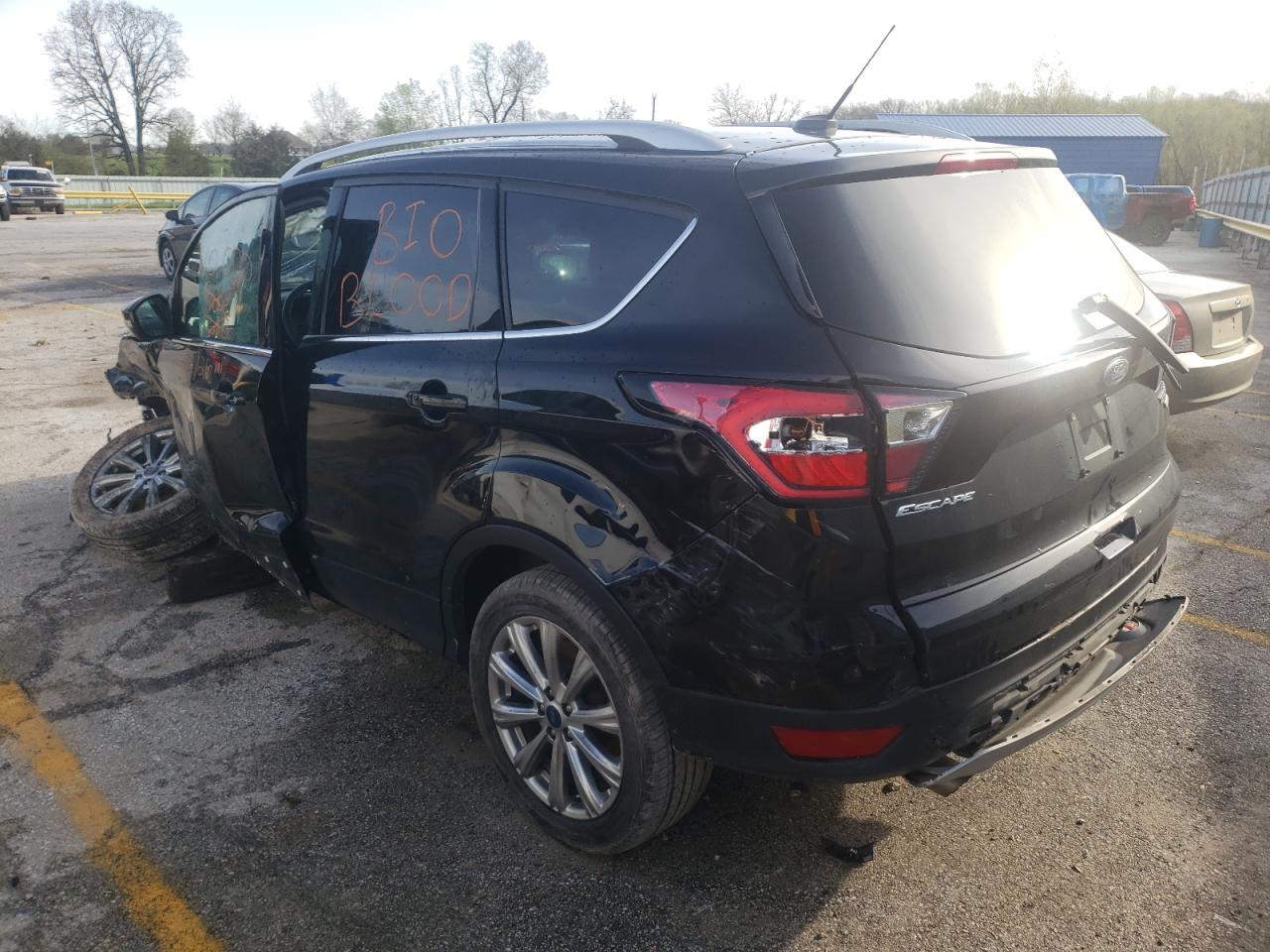 Photo 3 from auction – 2017 FORD ESCAPE TIT with VIN 1FMCU0J98HUE56293