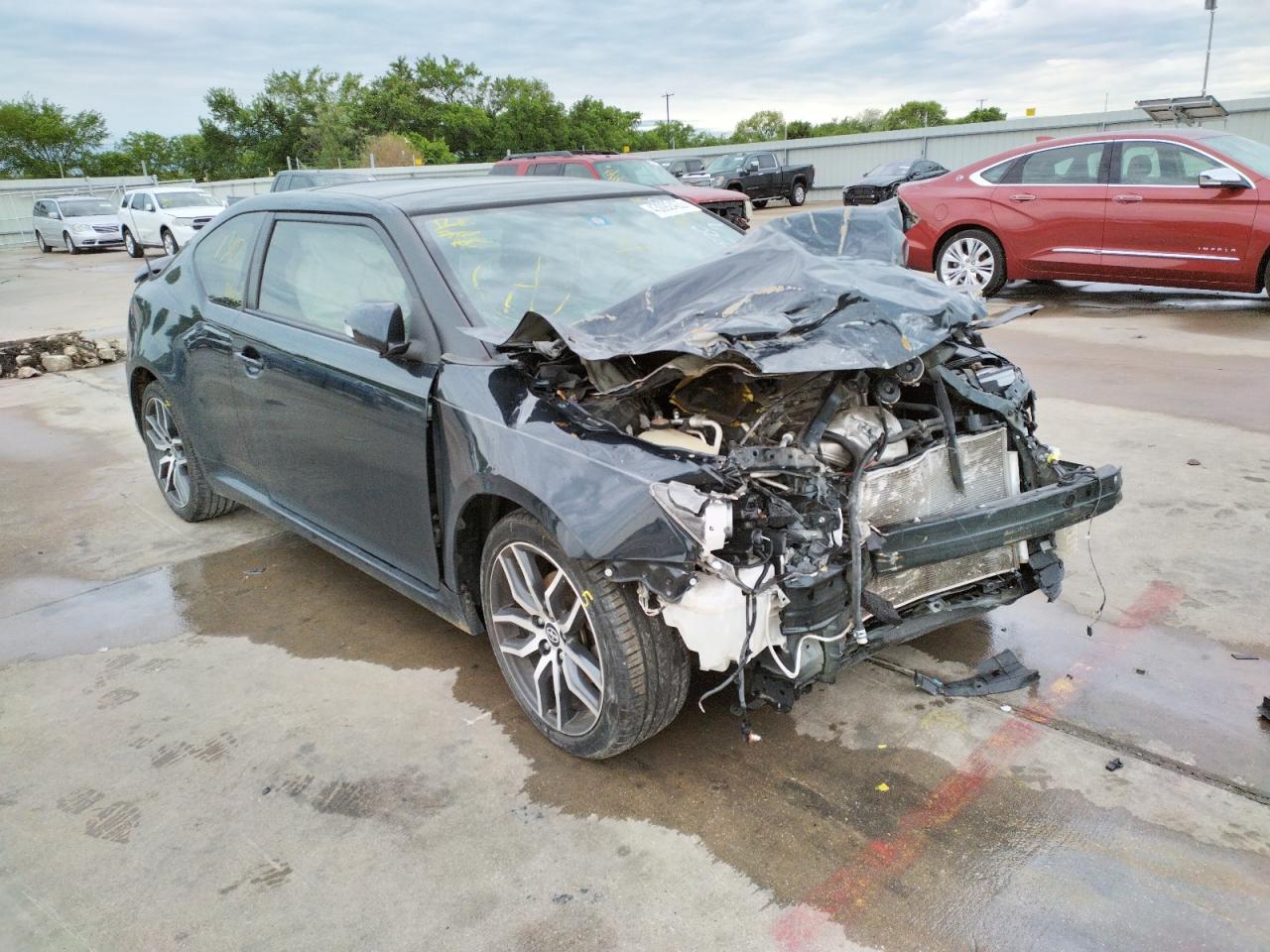 TOYOTA SCION TC 2015 with VIN JTKJF5C75FJ001729 - Photo from auction