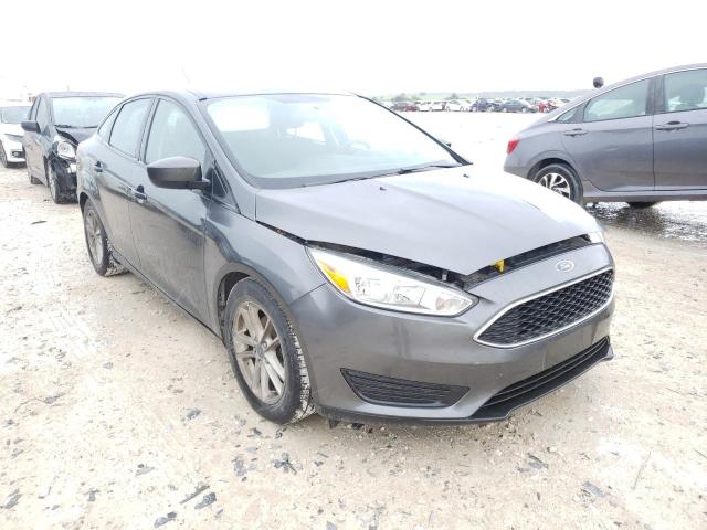 FORD FOCUS SE 2018 with VIN 1FADP3F29JL212151 - Photo from auction
