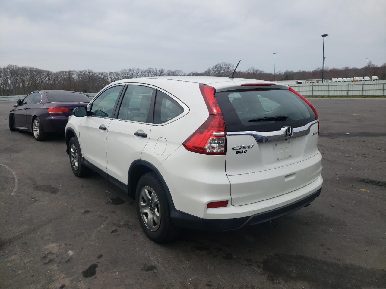 Photo 3 from auction – 2016 HONDA CR-V LX with VIN 5J6RM4H36GL042760