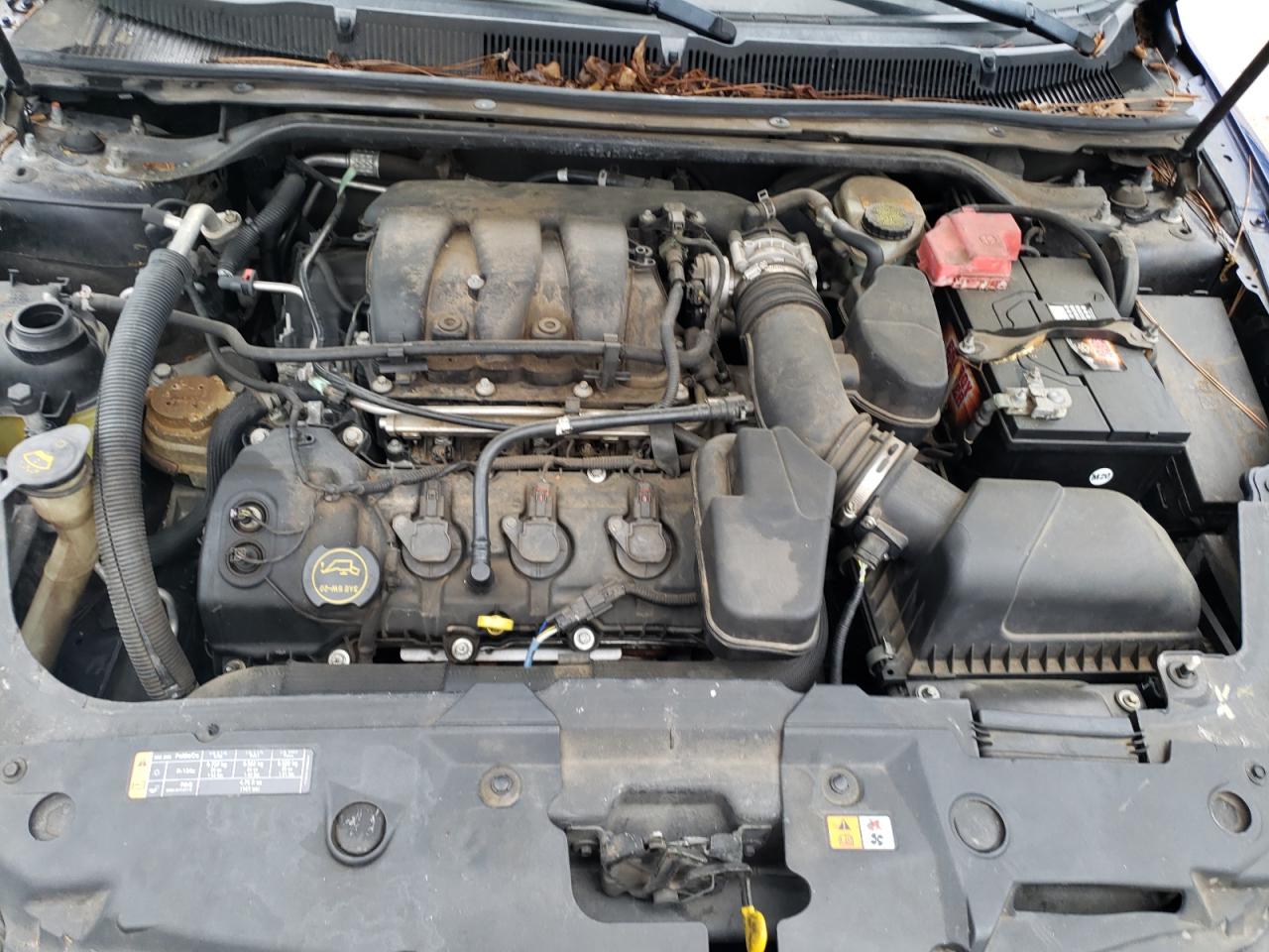 Photo 7 from auction – 2013 FORD TAURUS SEL with VIN 1FAHP2E87DG114380