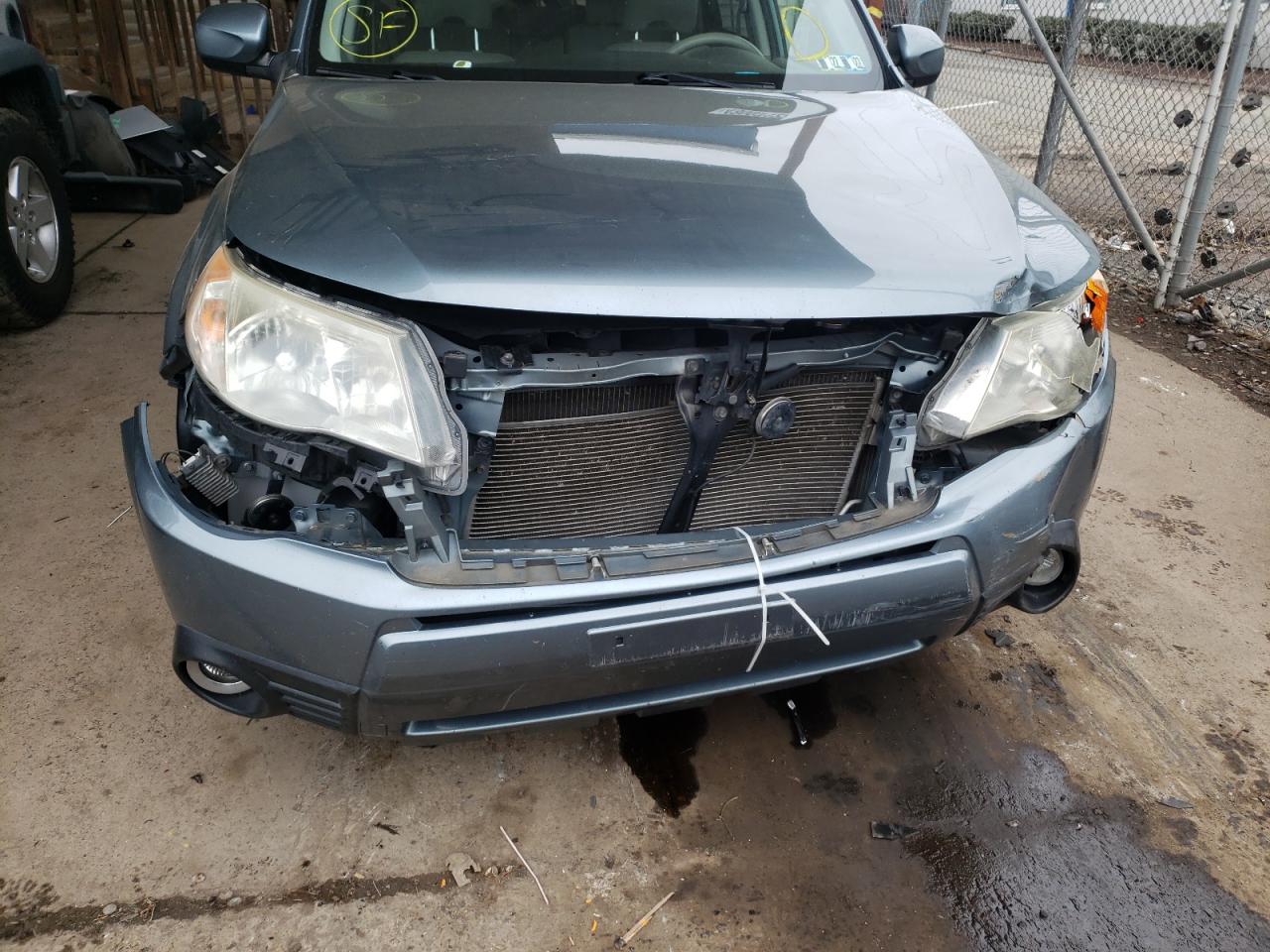 Photo 9 from auction – 2011 SUBARU FORESTER L with VIN JF2SHAEC0BH724657