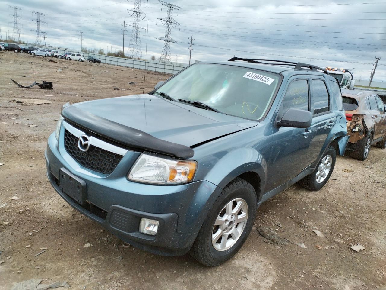 Photo 2 from auction – 2010 MAZDA TRIBUTE I with VIN 4F2CY9C71AKM02022