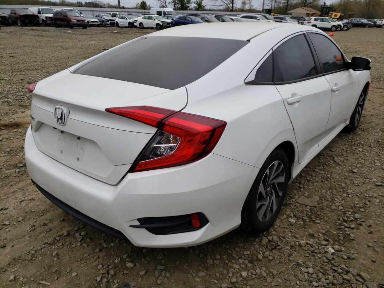 Photo 4 from auction – 2016 HONDA CIVIC EX with VIN 2HGFC2F74GH524664