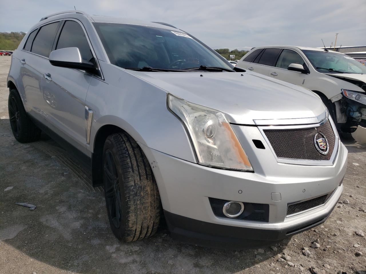 CADILLAC SRX PERFOR 2014 with VIN 3GYFNCE34ES656678 - Photo from auction