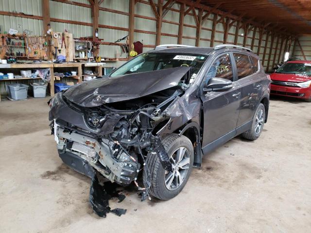 Photo 2 from auction – 2018 TOYOTA RAV4 LE with VIN 2T3ZFREV1JW431264