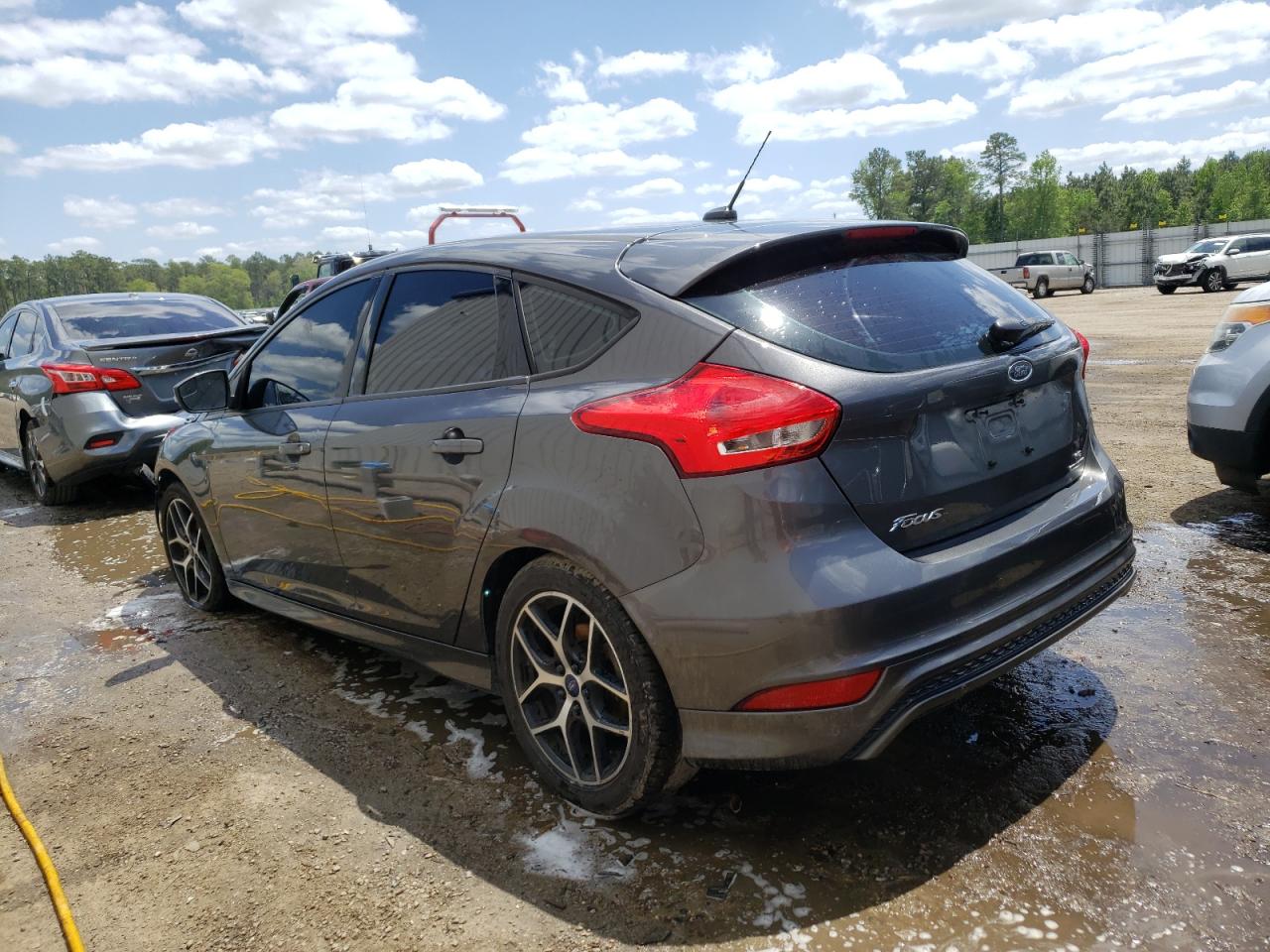 Foto 3 de la subasta – 2015 FORD FOCUS SE con VIN 1FADP3K24FL216055