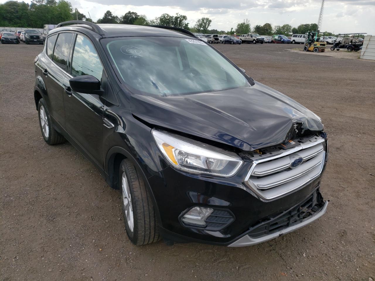 FORD ESCAPE SE 2018 with VIN 1FMCU0GD3JUB03350 - Photo from auction
