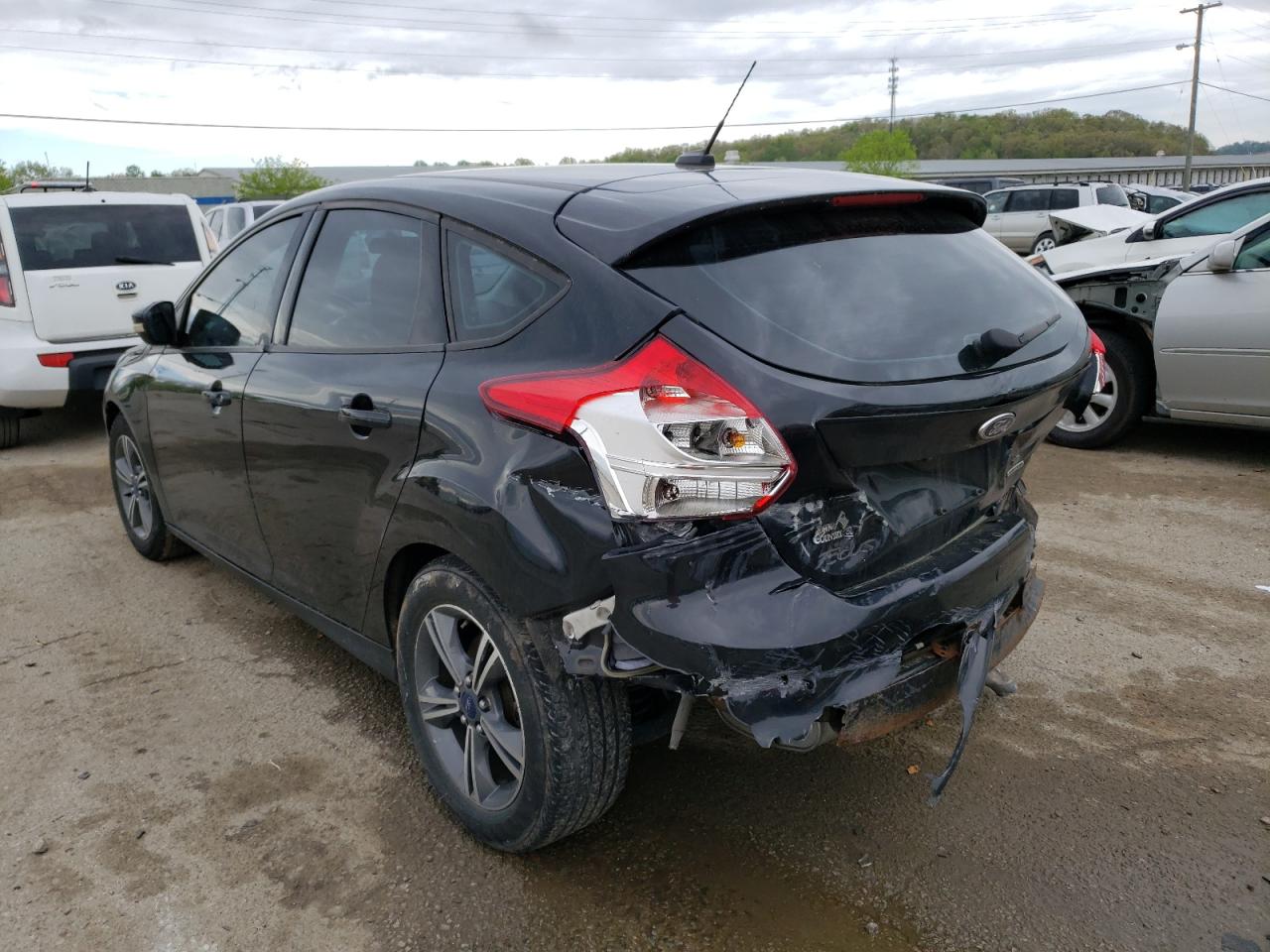 Photo 3 from auction – 2014 FORD FOCUS SE with VIN 1FADP3K21EL128921