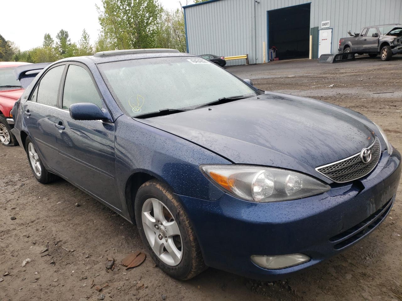 TOYOTA CAMRY LE 2002 with VIN JTDBE30K820013658 - Photo from auction