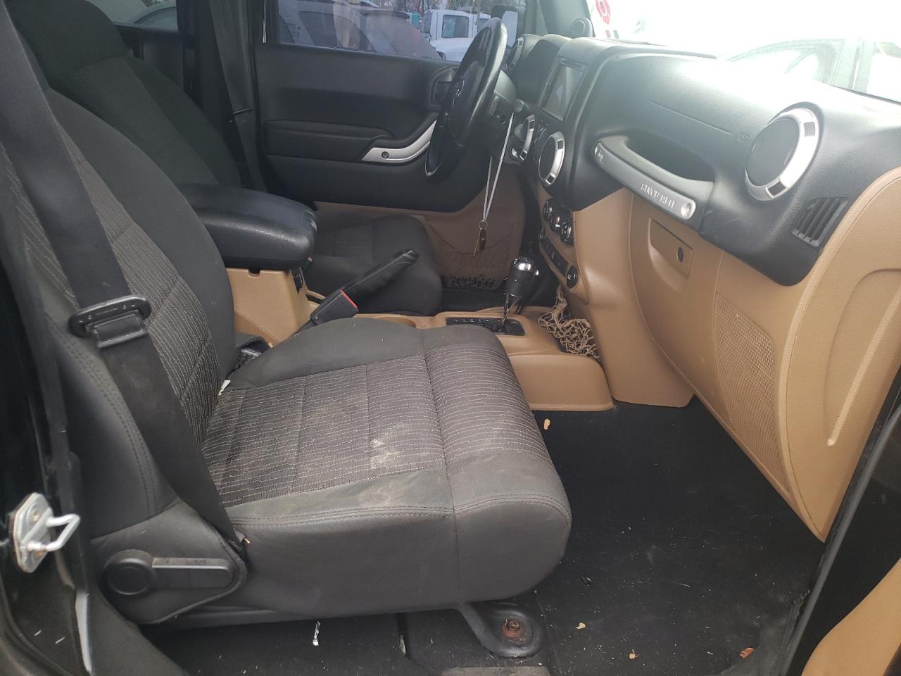Photo 5 from auction – 2011 JEEP WRANGLER U with VIN 1J4BA5H11BL577664