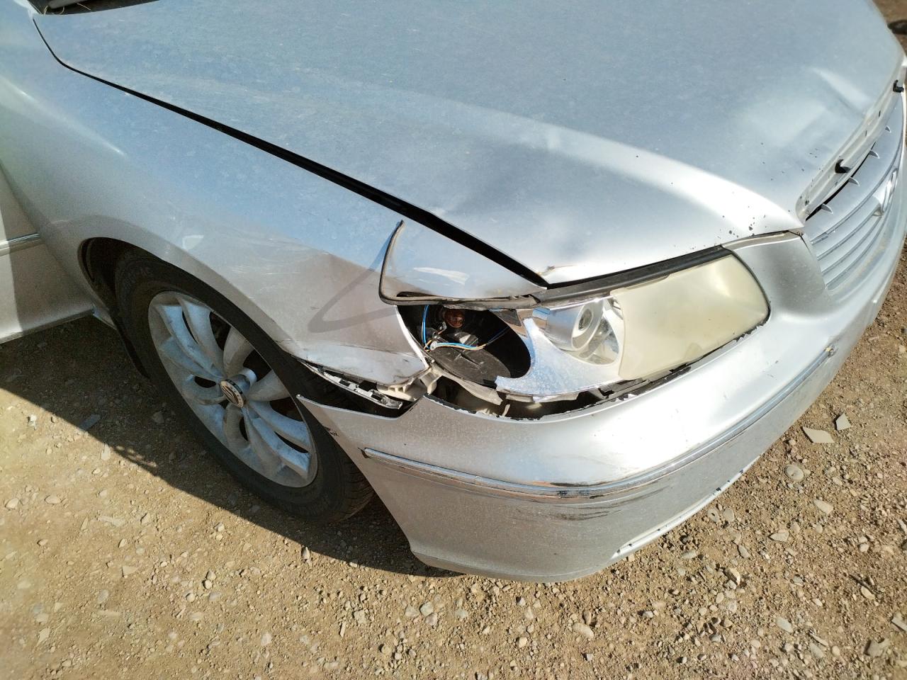 Photo 9 from auction – 2007 HYUNDAI AZERA SE with VIN KMHFC46FX7A212053