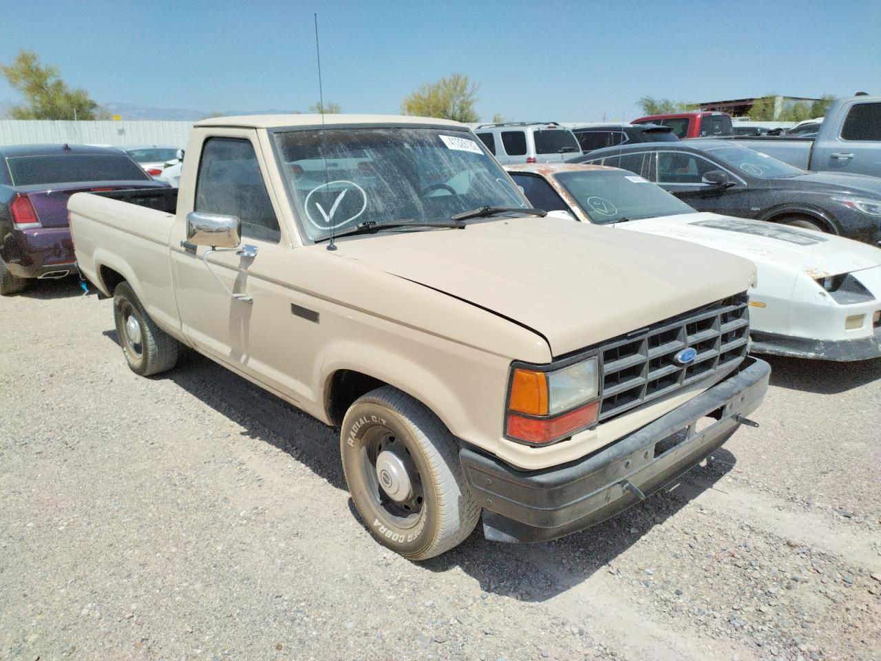 FORD RANGER 1990 with VIN 1FTCR10A2LUA19275 - Photo from auction